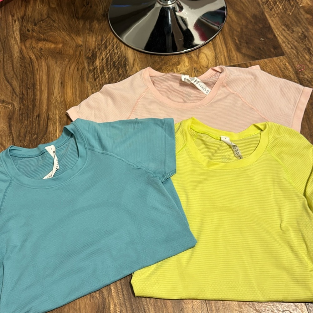 3 swiftly tech lululemon shirts all size 4 in good condition